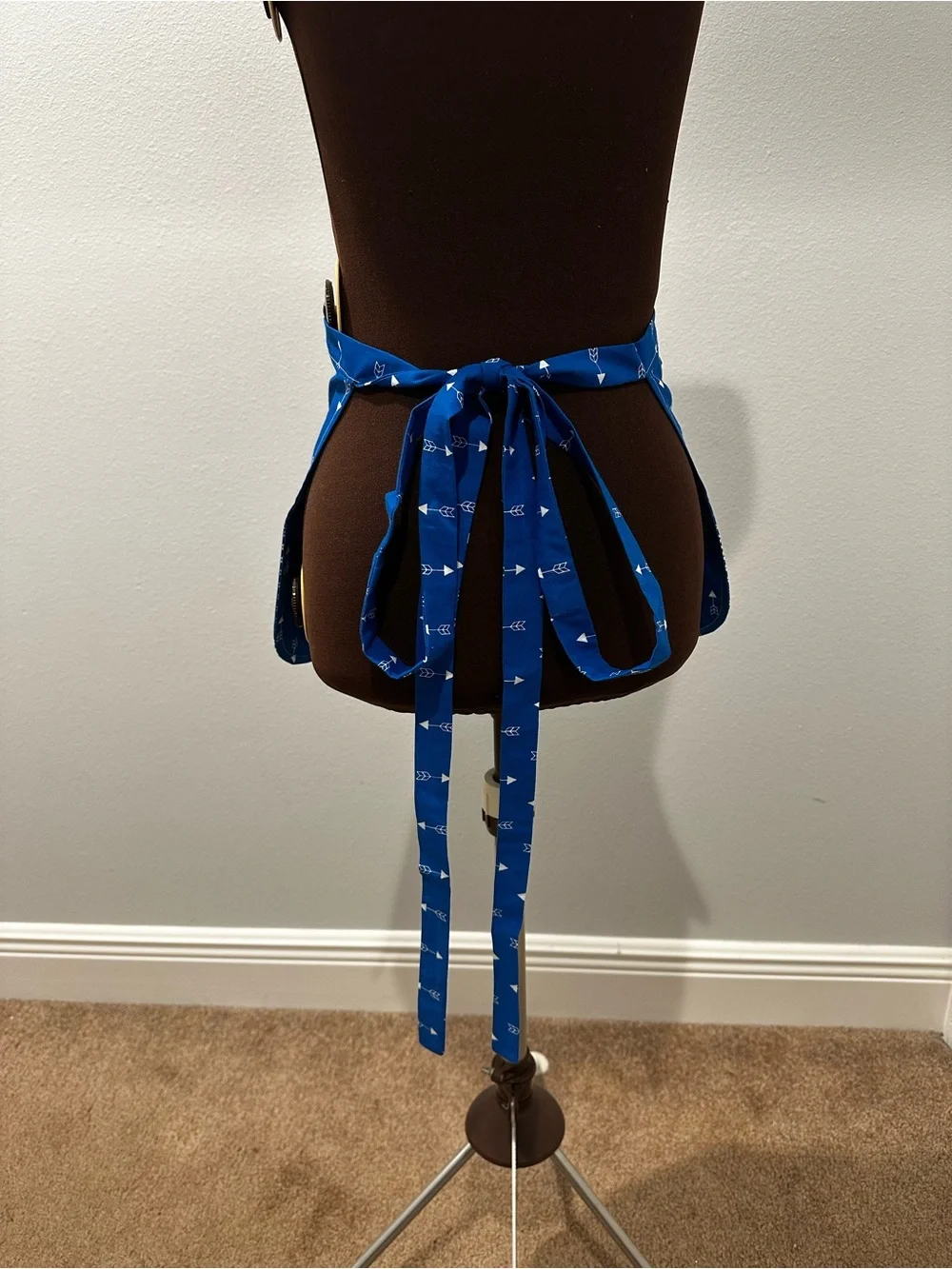 Blue Patterned Apron with Pockets across the front and a Snap Pocket
